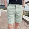 Plus taille 38-28 Fashion Summer Waffle Solid Shorts Men Korean Gnee Longueur Slim Fit Casual Office Suit Shorts Streetwear240416