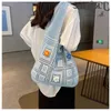 24ss kadın dokuma çanta büyük kapasite yeni niş tasarım yaz içi boş omuz çanta çanta alışveriş çantası kova çantası dokuma çanta 36cm shomu