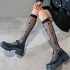 Chaussettes sexy jk chaussettes féminines jk lolita uniforme chaussettes minces chaussettes en soie adorent le cœur des sous-vêtements d'été avec des chaussettes de genou noires Q240427