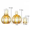 Bouteilles de rangement Luxury Gold Perfume Rechargeable Bouteille 50 ml Pumpe à vis de parfum arabe Pompe à vitre rond Atomizer Spray Mist 5pcs