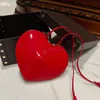Bolsa de grife vermelho Le Cour Heart Handle Bag Wristlet Rhinestone Stud