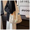 24ss kadın dokuma çanta büyük kapasite yeni niş tasarım yaz içi boş omuz çanta çanta alışveriş çantası kova çantası dokuma çanta 36cm shomu