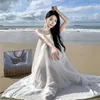 Casual klänningar 2024 Kvinnor Summer White Mori Fairy Sling Big Swing Chiffon Dress Bohemian Off the Shoulder Seaside Semester sundress