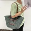 Frauen luxuriöser Strandtasche Frankreich Single Schulter Handtasche Neu klassische klassische handgewebte Strohbeutel Urlaub Freizeit Gemüse Korb Handheld große Einkaufstaschen mit großer Kapazität