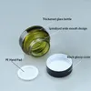 Bouteilles de rangement 10pcs 15g / 30g / 50g Verre en verre vert vide rechargeable maquillage pot de voyage Face à crème de voyage