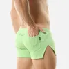 Shorts masculinos bolso calças curtas simples boxers macios sólidos esportes amarrar troncos respiráveis clássicos confortáveis