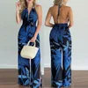 Mujeres Vintgae Boho Jumpsuos de estampado floral MANEVELESS VNECK Halter Backless Slit Wideleg Jumpsuit Tropical Tropical Long Playsuit 240423