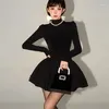 Robes décontractées Qianjin petite robe noire princesse féminine automne et manteau hivern