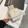 Torby na ramię niszowy projekt rombowy haftowa torba niciowa żeńska moda Messenger Pearl torebka wiadro Szerokość: 11,5 cm