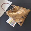 Neue chinesische Tasche strukturierter grauer Stoff Ein -Stück -Tasche unabhängiger hausgemachter Lederseil Schultergurt Design Handtasche