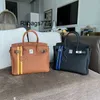 Echte Lederhandtasche Bk Silberknopf Togo Leder vertikaler Streifen Farbblockierbeutel Leder Handtasche Mode vielseitige erste Schicht Cowhide Umhängetasche Fashio