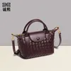 Yeni el dokuma çanta moda hamur tatlı çantası üst düzey ejderha xiang çanta dokusu trend omuz crossbody çanta