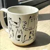 Tazze creative a mano disegnata tazze in ceramica cartone animato ufficio di grande capacità e tazze da caffè al latte per la colazione in famiglia J240428