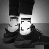 Chaussettes pour hommes au large de la mode Streetwear femmes hommes de haute qualité coton tout-match flèche x imprime respirant noir blanc mélange football bask otlsw