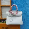 Luxurys Handbag Top Leather Platinum Sac première couche Lycye Pattern 20cm Fashion Handd Messenger Mini Buckle Womens