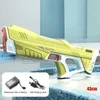 Toys Gun Electric Water Gun absorbant automatiquement la haute pression forte charge extérieur bataille interactive plage eau pistolet gris toys t240428