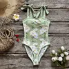 Menas de banho feminina Double -Sidlaided Wear One Piece Swimsuit 2024 PRIMIDADE CARTA MULHER MULHER PROJO BAIO BAIO MONOKINI NATA