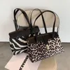 Bag stor kapacitet Leopard Tote Women's Shoulder 2024 Fashion Högkvalitativ PU -läderdesigner Handväska och plånböcker