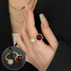 Fashion significa anillos de alta calidad para hombres y mujeres Design Bloqueo de color anillo elegante Bola redonda de moda para mujer con vnain común