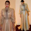 Marokkaanse avond gouden elegante kaftan jurken lange mouwen een lijn Arabisch formele ocn -jurken Appliques High Neck Satin Celebrity feestjurk voor vrouwen Rabic Ppliques