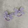 Accessoires de cheveux 2024 printemps / été coréen doux bébé bébé et filles en cuir clairs plaid violet mini