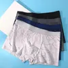 8Pcs/Lot Mens Sexy Underwear Boxer Shorts Milk Silk Soft Comfortable Fabric Fashion Print Breathable Antibacterial Mens Shorts 240412