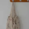 Estilo nacional charme antigo, novo estilo chinês tira -tassel saco de nicho simples saco de pano de grande capacidade para mulheres únicas mulheres