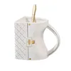 Mugs Coffee Cup Tea Cup Set Coffee Cup Ceramic Travel Cup Handväskaformad kopp med sked lämplig för kvinnor J240428