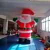 도매 거인 팽창 식 크리스마스 장식 산타 클로스 풍선 스탠딩 모델 XMAS 야외 디스플레이를위한 송풍기.