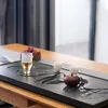 Tee Tabletts Geschnitztes natürliches schwarzes Gold Steinschale geprägtem Haushalt kleiner Tisch Set geschnitzt
