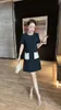 Little Black Robe 2024 Summer New Western Round Neck Office Worker A-Line Jirt Age Robe réductrice pour les femmes