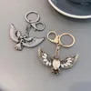 Keychains Opal Eagle Spreading Wings Retro Metal Kelechain Men Car Crystal Bijoux Bijoux ACCESSOIRES CADE