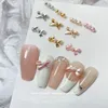 20pcs kawaii 3d blanc rose ballet ruban bowknot arc ballerina fille alliage perle nail art diy ongles accessoires décoration charmes 240425