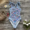 Kvinnors badkläder dubbel -sidosidig slitage en bit baddräkt 2024 Söt tryck kvinnor som bågar kostym strandkläder monokini simma