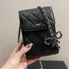 Boog mobiele telefoon tas high-end aangepaste geschenkdoos dames verticale sectie mobiel crossbody tas afneembare metalen keten mobiele telefoon eenschouderrugzak