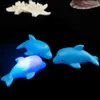 Brinquedos de banho Baby Toys Baby Dolphin Light Up Bath Toy Kids Water Toys Liderado Growing Shotler Toys Luminous Beach Pool Shower Game para crianças Presentes