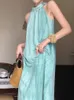 Hängande nack ärmlös klänning för kvinnor sommardesign som bär en lös lång kjol med fram- och bakväst 240426