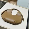 Sac de créateur haut de gamme sac à main pour femmes Nouveau sac en cuir authentique en cuir de grande capacité Fashion DrawString Handd épaule sous-armoise