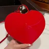 Bolsa de grife vermelho Le Cour Heart Handle Bag Wristlet Rhinestone Stud