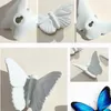 Dekorative Figuren nordischer Stil weißer Keramik Schmetterlinge hängende Dekorationen für Wohnzimmer El Hintergrund Wand Schmetterling Anhänger