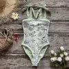 Menas de banho feminina Double -Sidlaided Wear One Piece Swimsuit 2024 PRIMIDADE CARTA MULHER MULHER PROJO BAIO BAIO MONOKINI NATA