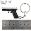 Gun Toys Tot Gun Keychain Alloy G17 P18C Mini All Metal Model Game Surrounding Lights Keychain Pistol Toy Birthday Gift T240428