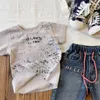 ファッションキッズベイドパターンTシャツDDスタイルボーイズガールズレターグラフィティ半袖Tシャツ夏の子供ルースカジュアルトップZ7920