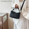Loeweelry Small Bag Womens 2024の高品質のオリジナルデザイナーバッグ2024新しい人気のあるファッショナブルな西部テクスチャ幾何学的スプライシングハンドヘルドブランドロゴ