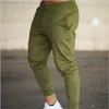 Masowe mężczyzn siłowni Pure Color Pants Joggers Fitness swobodny długi trening chude spodnie dresowe joggerowe spodnie dresowe 240425