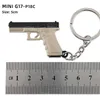 Gun Toys Tot Gun Keychain Alloy G17 P18C Mini All Metal Model Game Surrounding Lights Keychain Pistol Toy Birthday Gift T240428