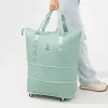 Sacos Sacos de bagagem dobráveis Bolsa de consignação leve com rodas de grande capacidade Oxford Drywet Separação ao ar livre para mulheres