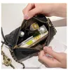 Väska kvinnlig modemessenger cylinder 2024 koreansk oxford trasa kudde enkla mini axel plånböcker