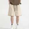 Short masculin Hommes décontractés solide simple taille élastique cordon de trémette d'été tout-correspondant streetwear coréen sportif sèchette rapide sèche