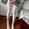 Calzini sexy in inglese coreano Lettera di seta stampata calze a forma di cuore a forma di cuore con fiocchi giapponese lolita jk calzini di gioco gotico stretto q240427